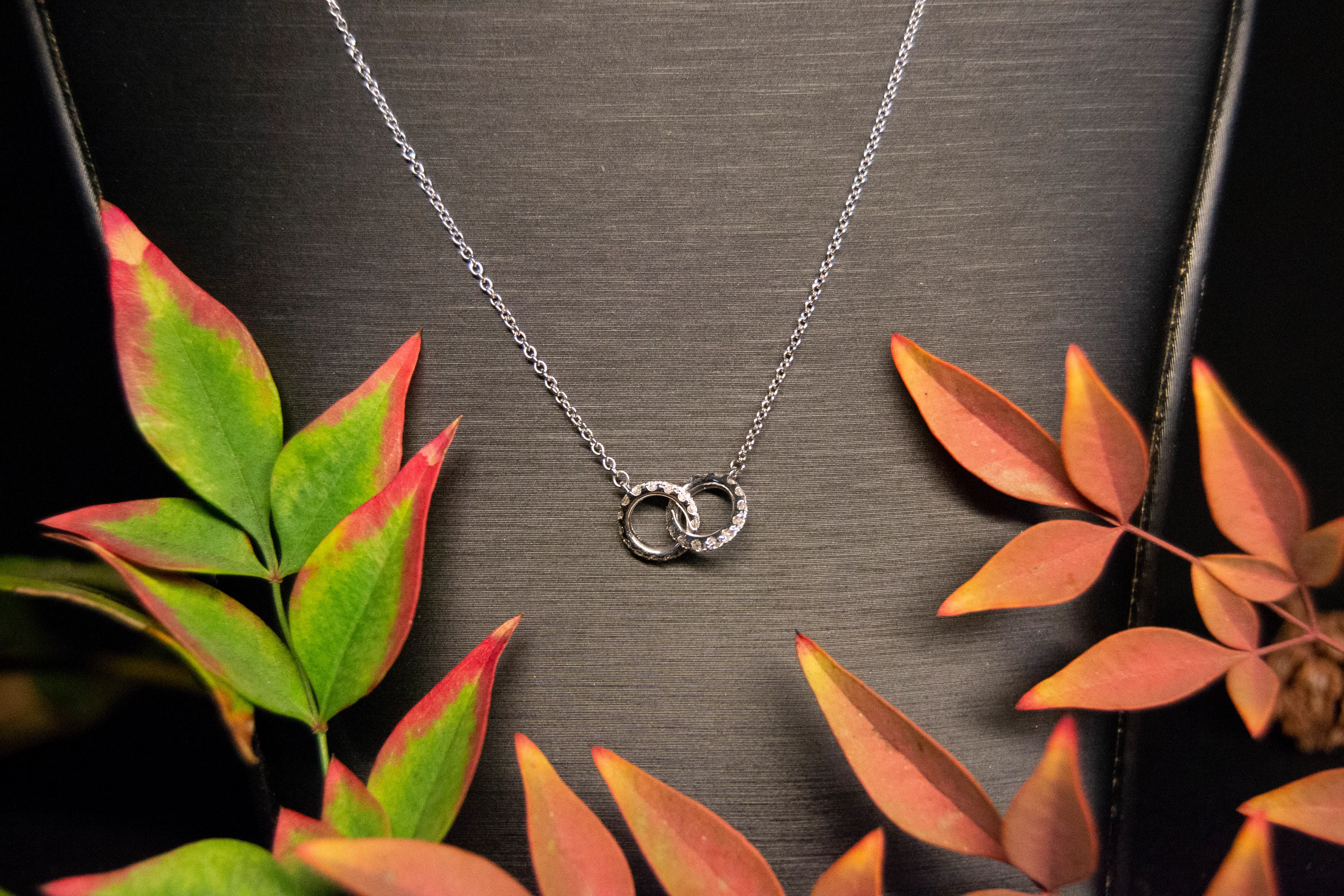 Hearts on Fire white gold interlocking diamond necklace The Diamond Center Claremont, CA