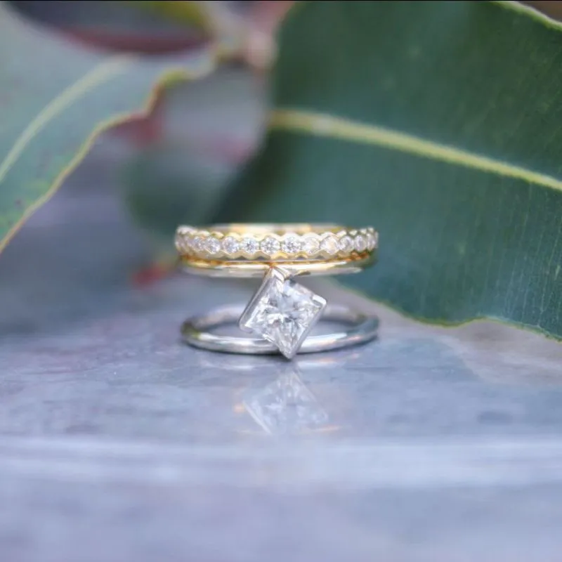 Princess Cut two-tone Diamond fashion ring yellow gold hearts on fire diamond band The Diamond Center Claremont, CA