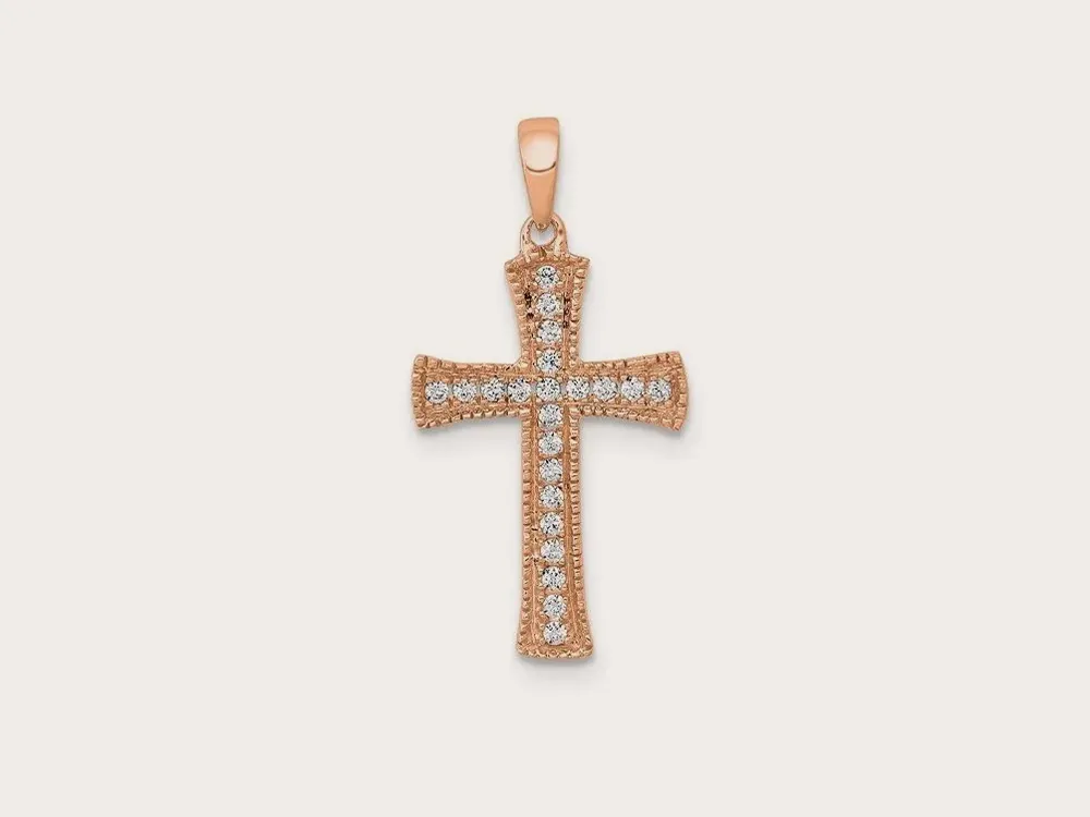 Rose gold cross pendant with diamonds. Click to explore religious jewelry.