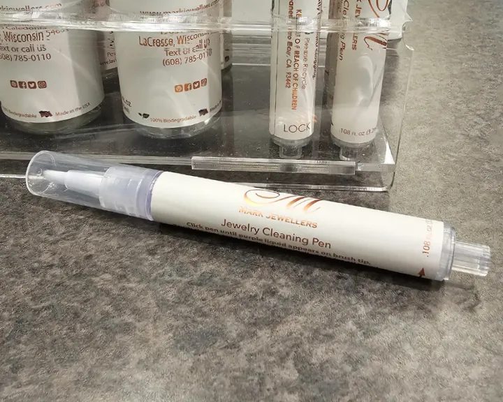 Lavish Click Clean Pen A travel version of Lavish cleaner that fits easily in your purse! This is a cleaner and scrub brush all in one, perfect for getting into those hard-to-reach spots on your jewelry. Mark Jewellers La Crosse, WI