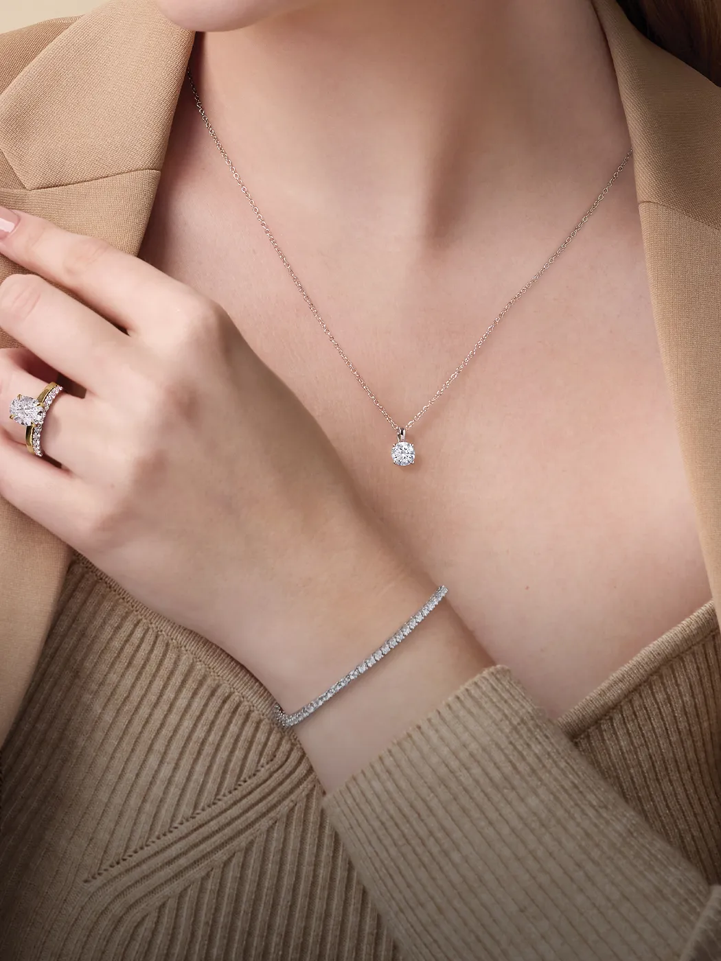 Elegant jewelry set with diamond necklace, ring, and bracelet. Explore bracelets at McGee & Company Greenwood Indiana.