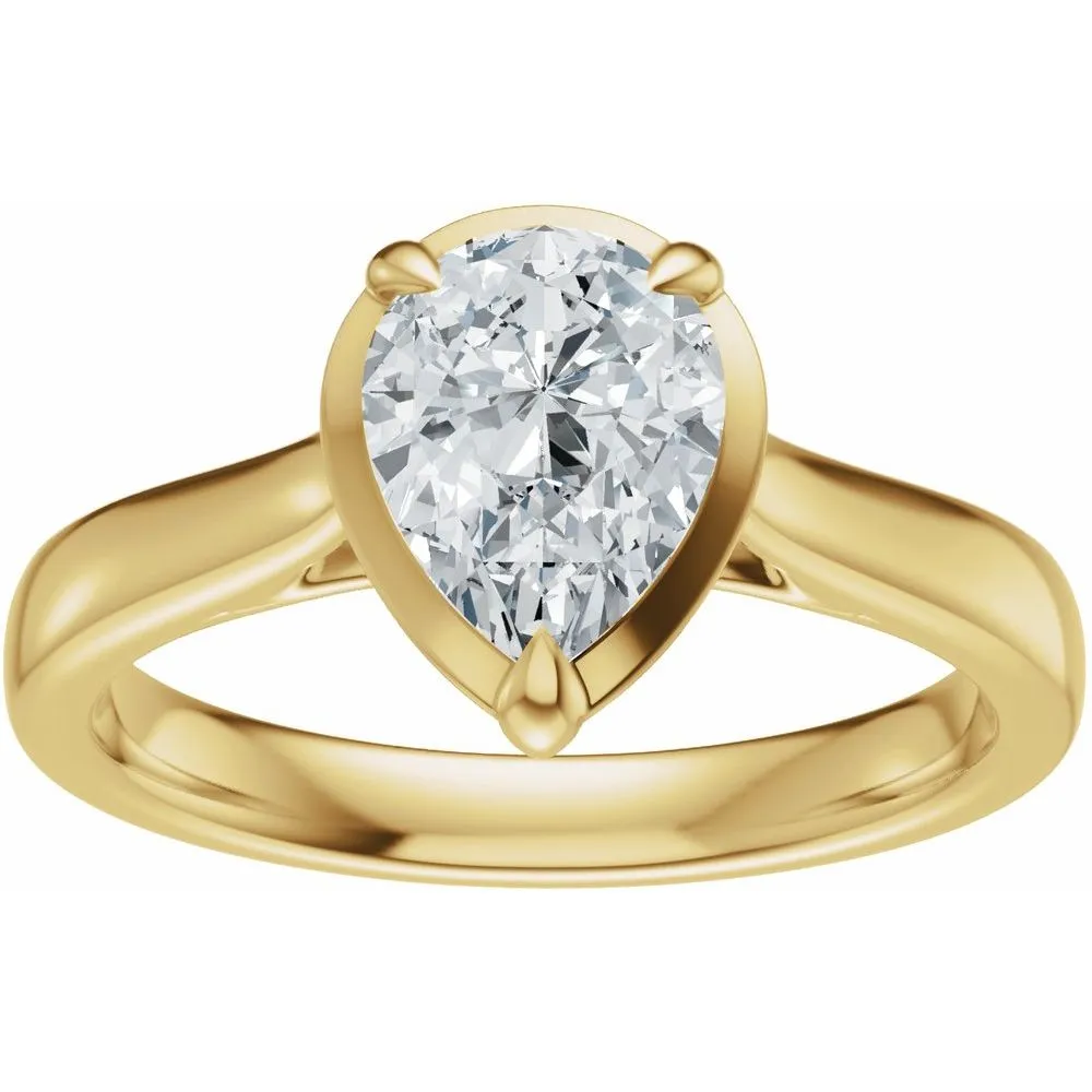 Pear-shaped diamond engagement ring set in yellow gold. Click to shop now at Mead Jewelers, Enid's fine jewelry store.