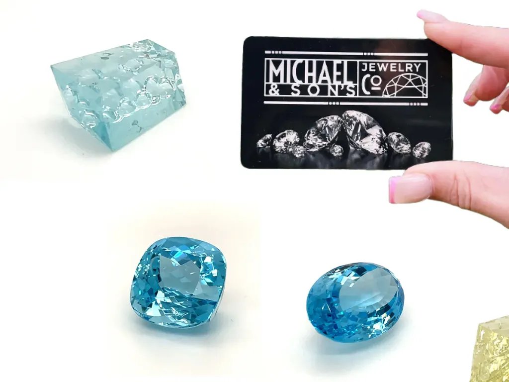 Blue gemstones and a business card for Michael & Son's Jewelers, showcasing fine jewelry options.