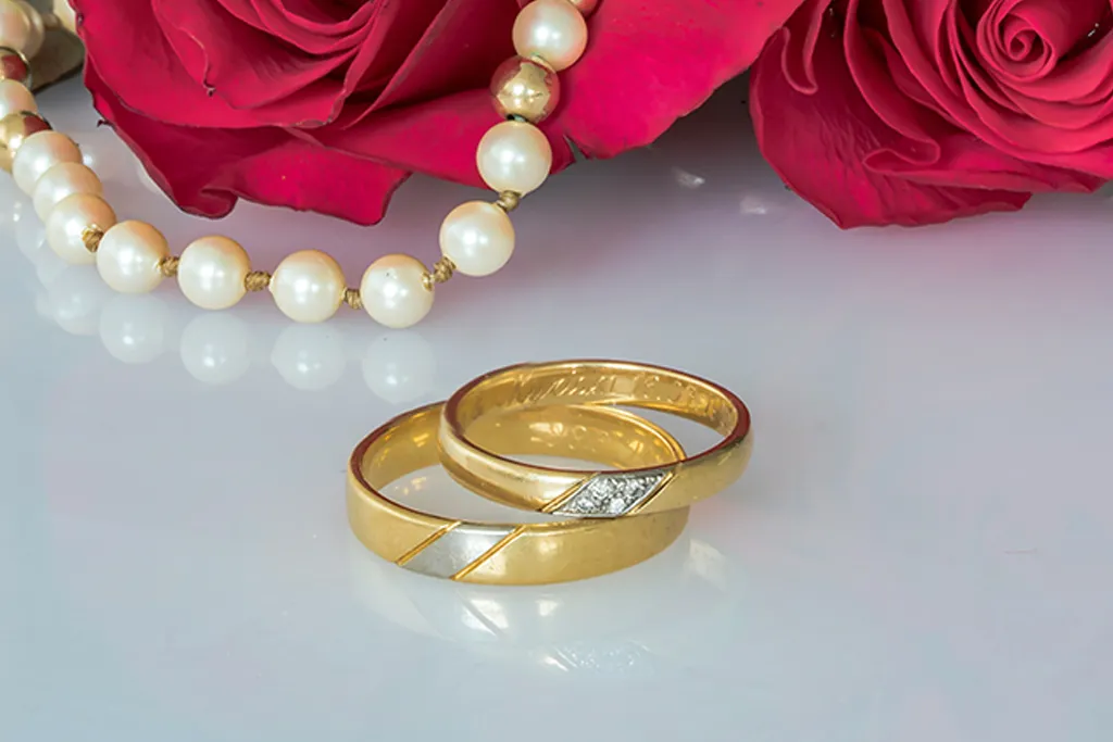 Luxurious unique wedding band with gem detail