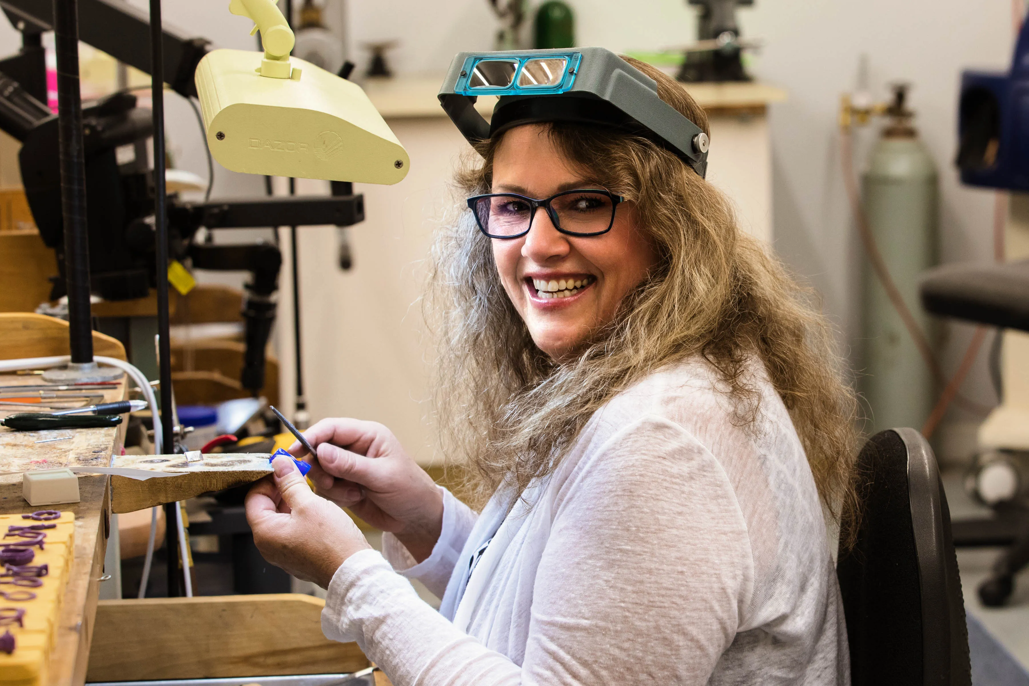Michele from Michele & Company Fine Jewelers working on a piece of jewelry