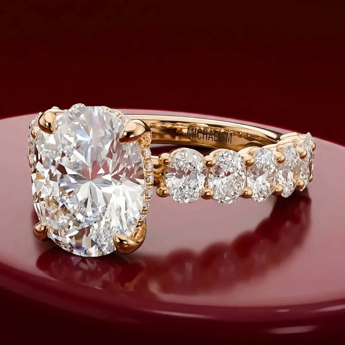 Luxurious gold engagement ring with large oval diamond and smaller diamonds on band.