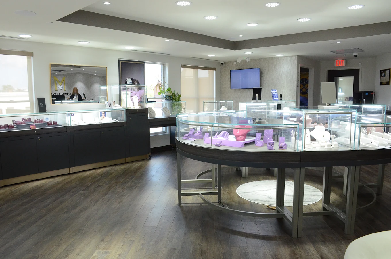 Jewelry store interior with display cases and elegant lighting. View all testimonials.