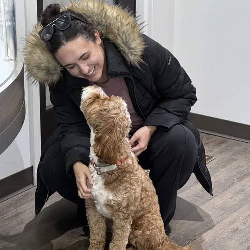 Milo greeting a client at Midtown Jewelers