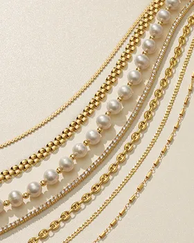 Gold chain and pearl bracelets