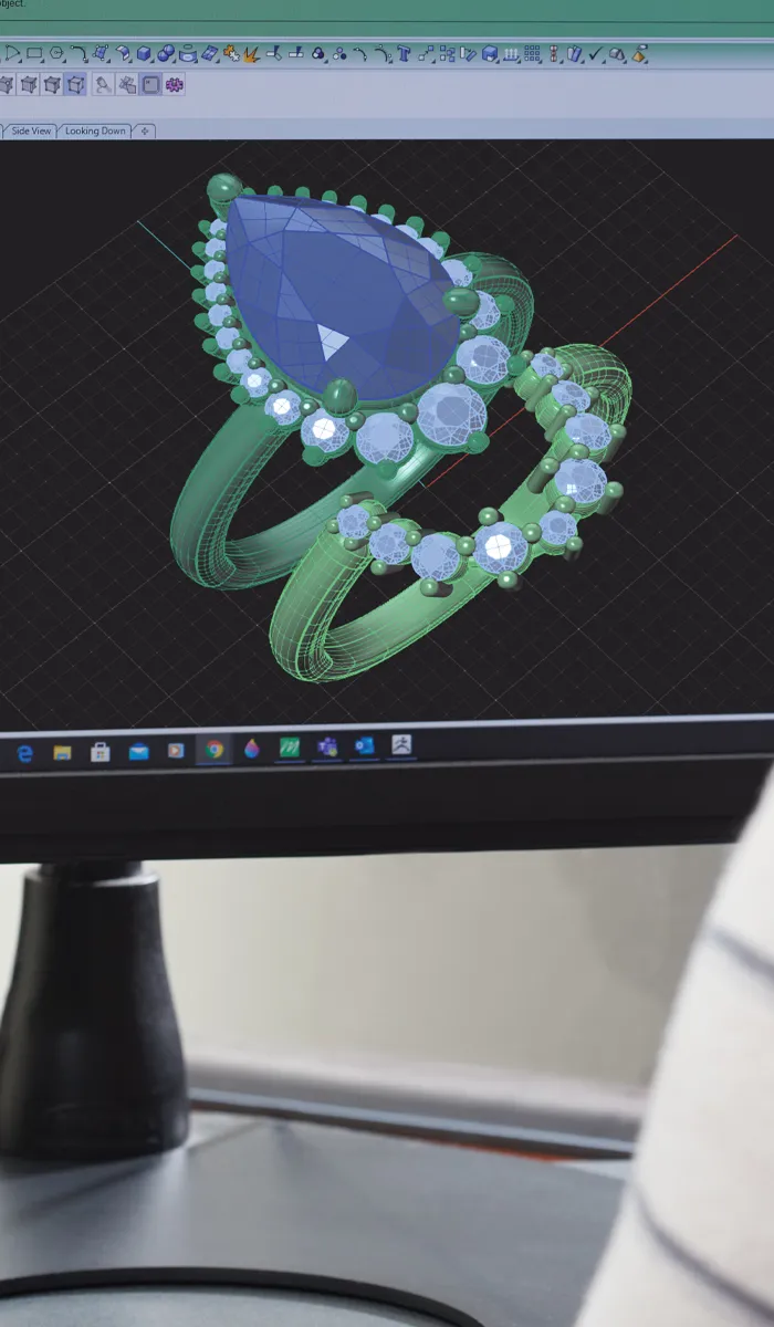 3D design of an elegant ring featuring a large blue gemstone and smaller diamonds, showcasing jewelry creation.