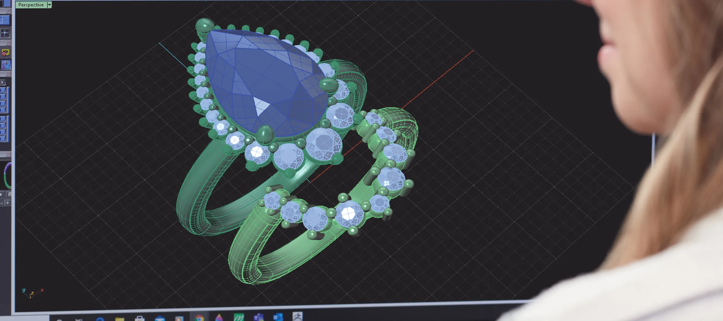 3D design of an elegant ring featuring a large blue gemstone and smaller diamonds, showcasing jewelry creation.