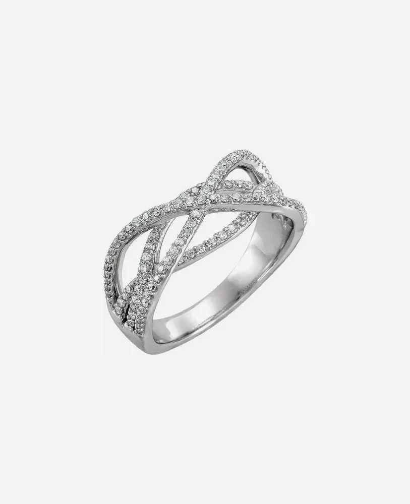 Silver infinity ring adorned with sparkling diamonds, showcasing a modern and elegant design.