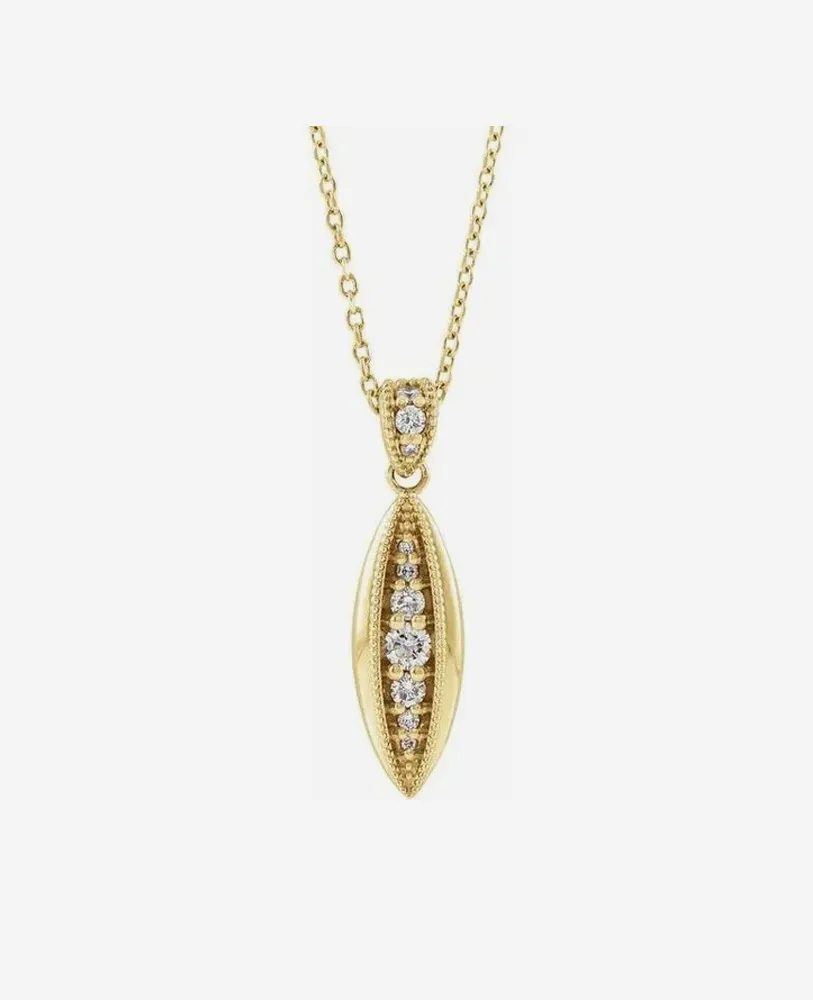 Gold pendant necklace with sparkling diamonds, perfect for elegant occasions.