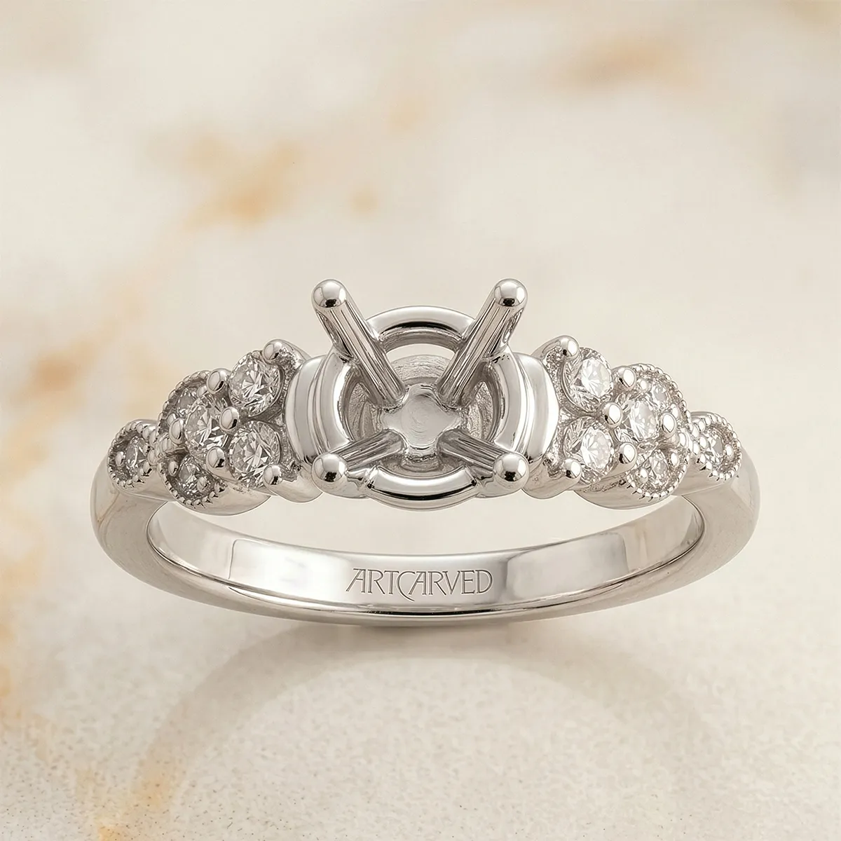 Diamond engagement ring setting with intricate side stones at Pearce Jewelers, West Lebanon. Explore ring settings.