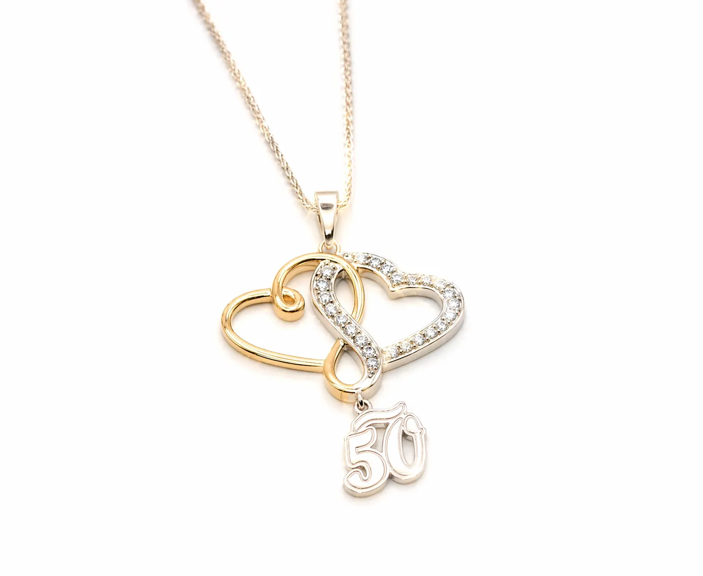 Gold and silver heart necklace with diamond accents and 