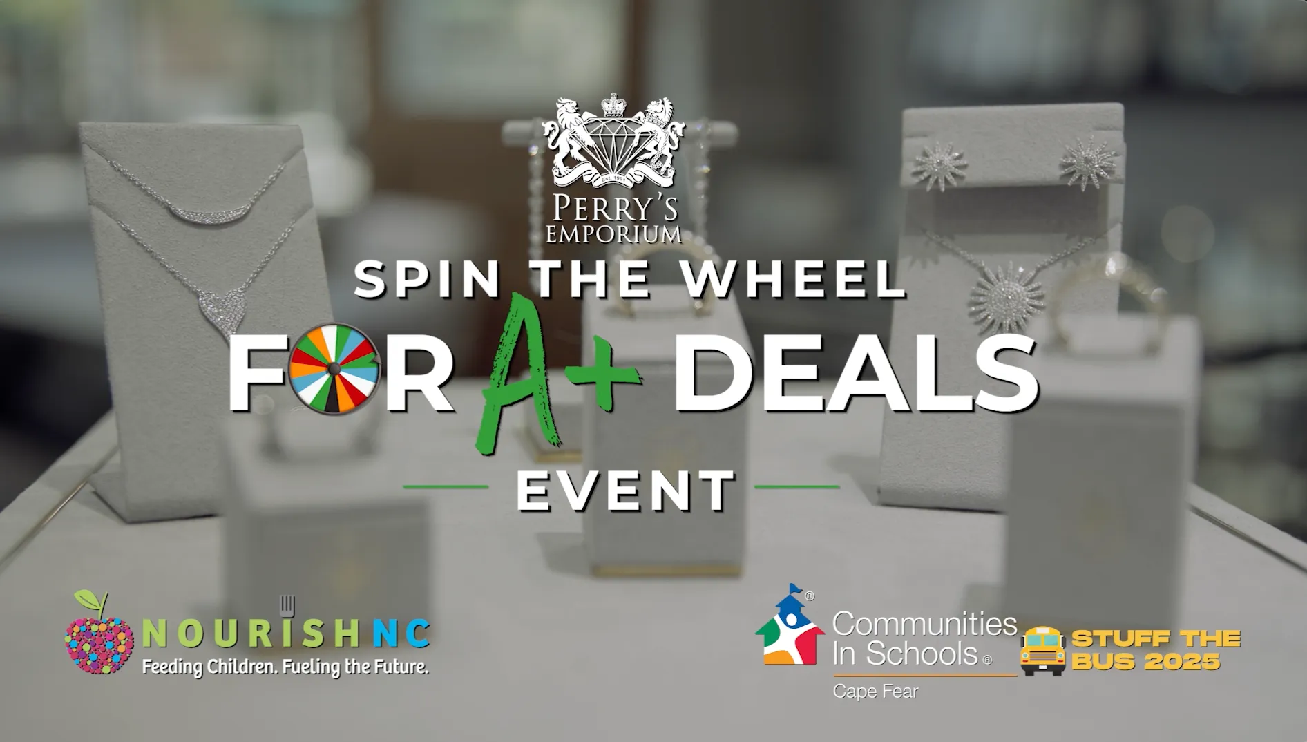 Perry's Emporium Spin the Wheel for A+ Deals event showcasing fine jewelry pieces.