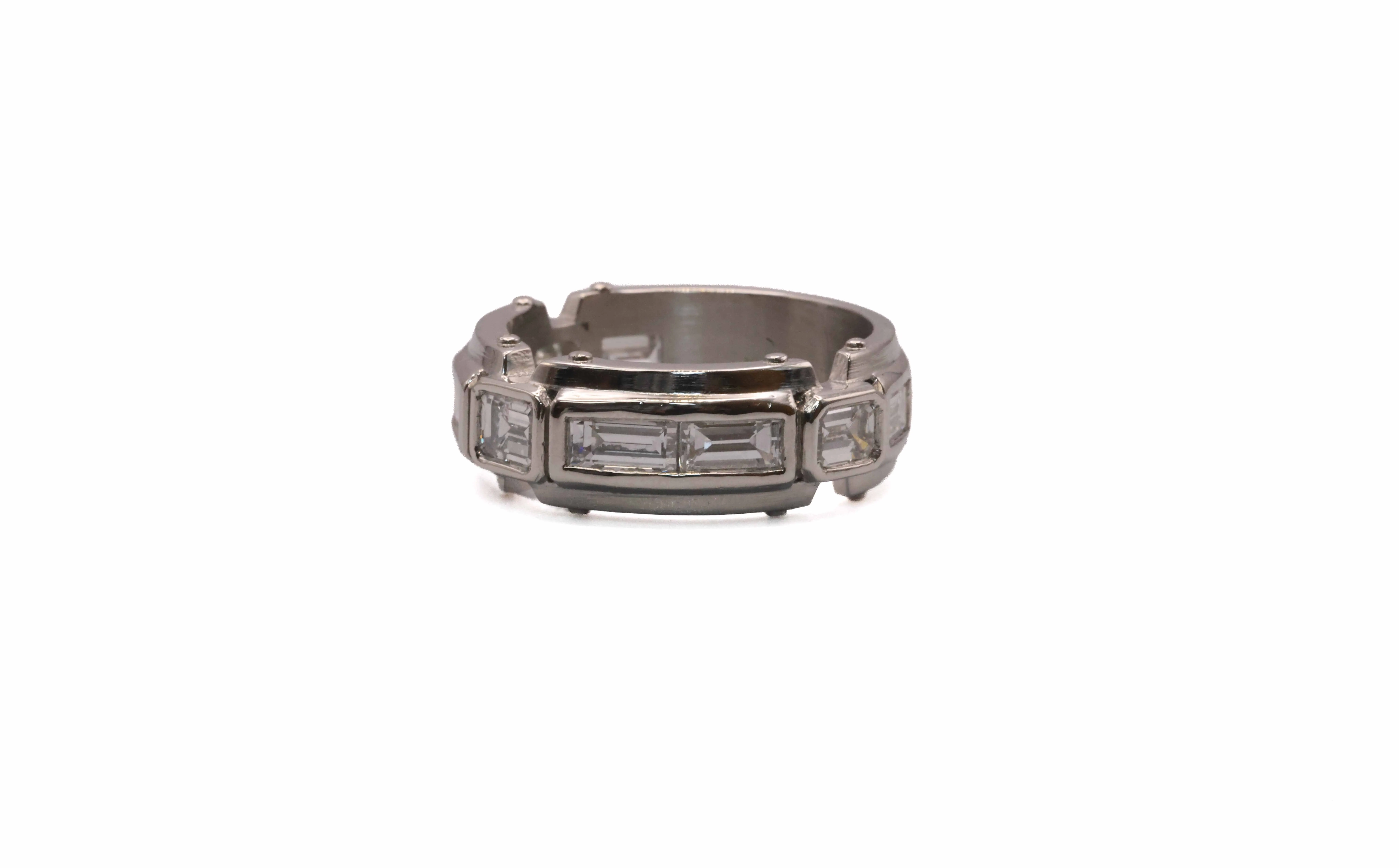 Silver ring with rectangular stones, showcasing a modern design. Visit Perry's Emporium for more fine jewelry.
