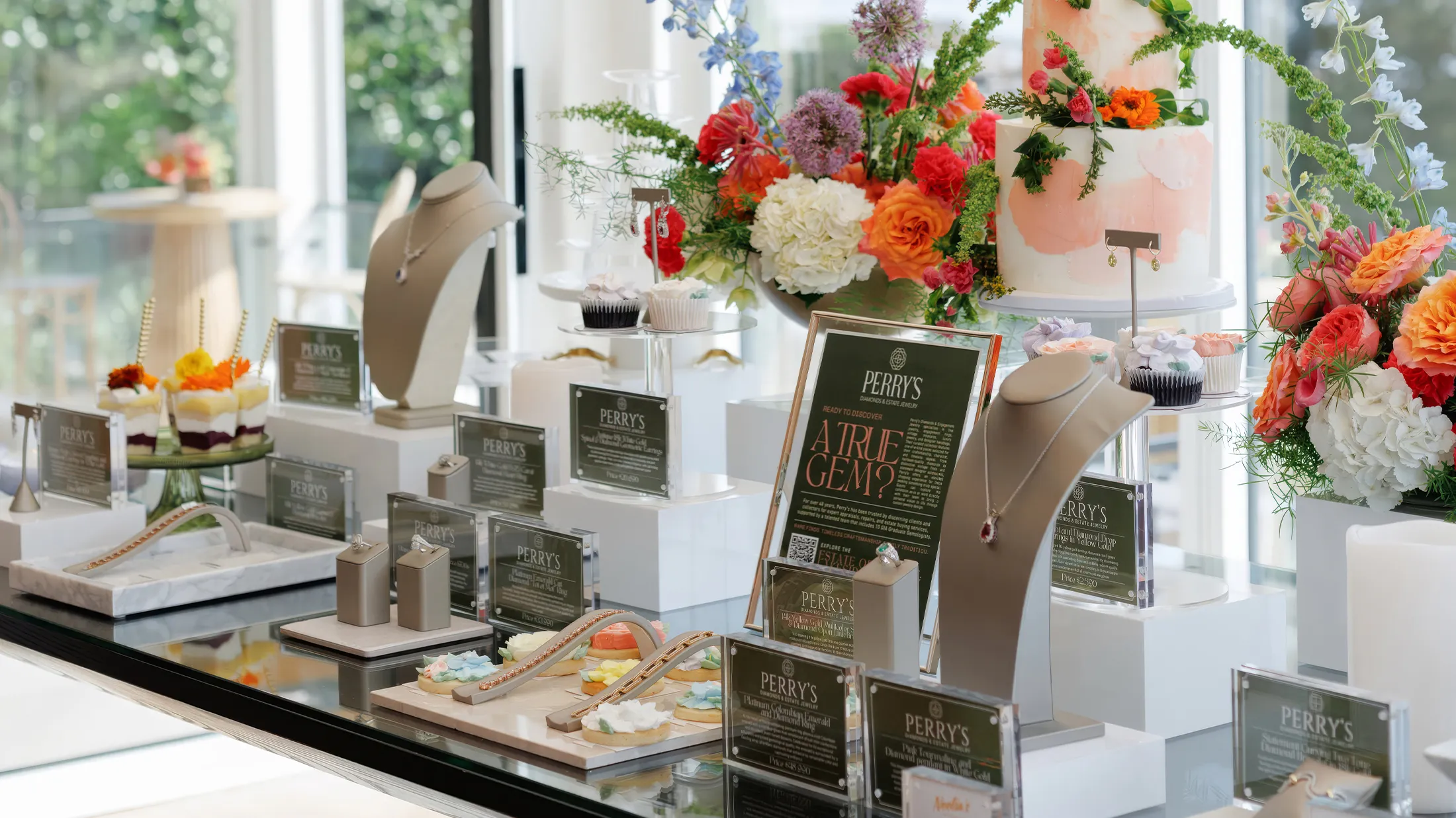 A display of sparkling diamond bracelets on a metal stand.