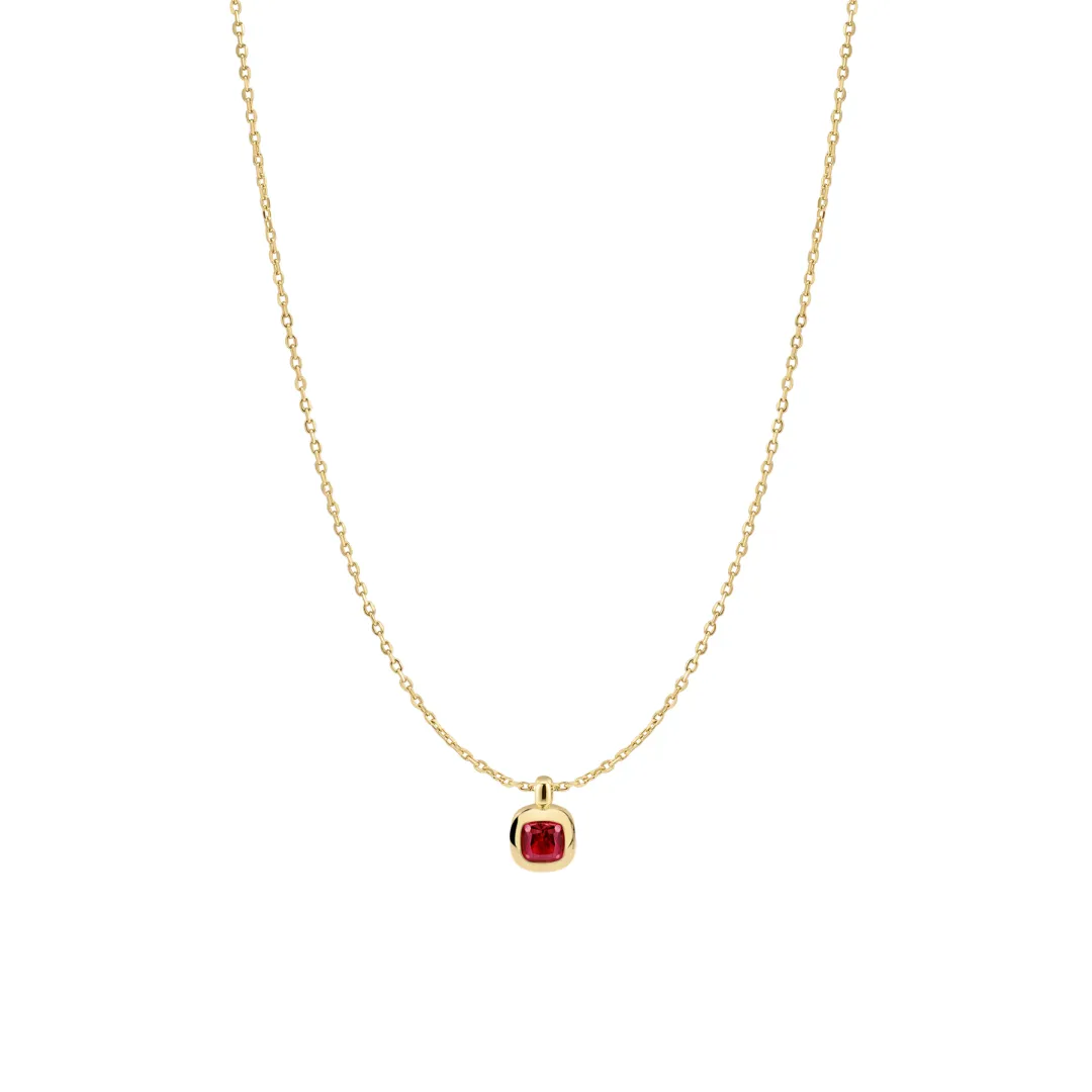 pear shape ruby and round diamond in a moi et toi necklace design. Peter & Co. Jewelers Avon Lake, OH