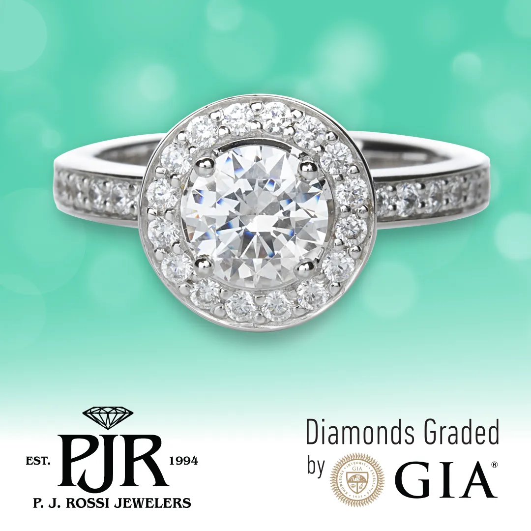 Elegant diamond engagement ring with halo setting, from P.J. Rossi Jewelers. Click to explore diamonds graded by GIA.