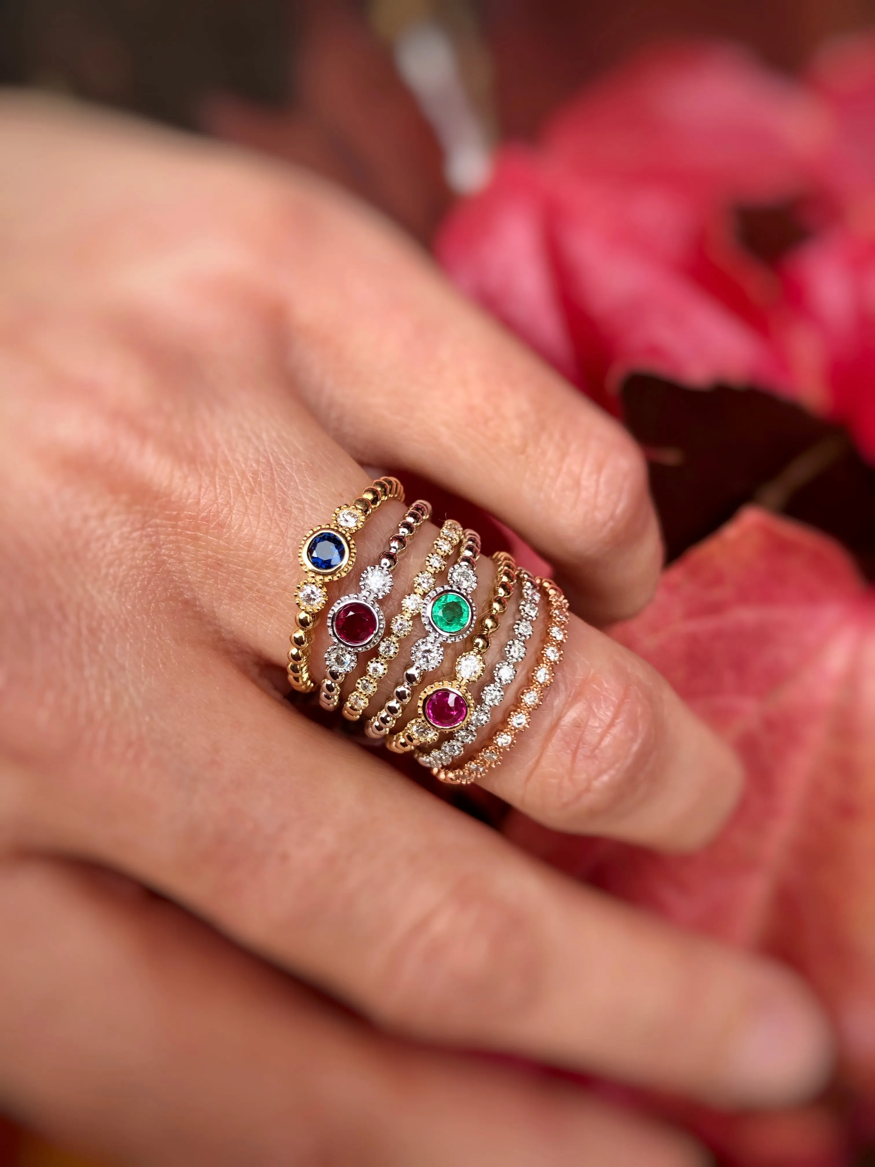 Elegant gold ring featuring a pink gemstone, perfect for engagement. Visit Premier Diamond Center for more rings.