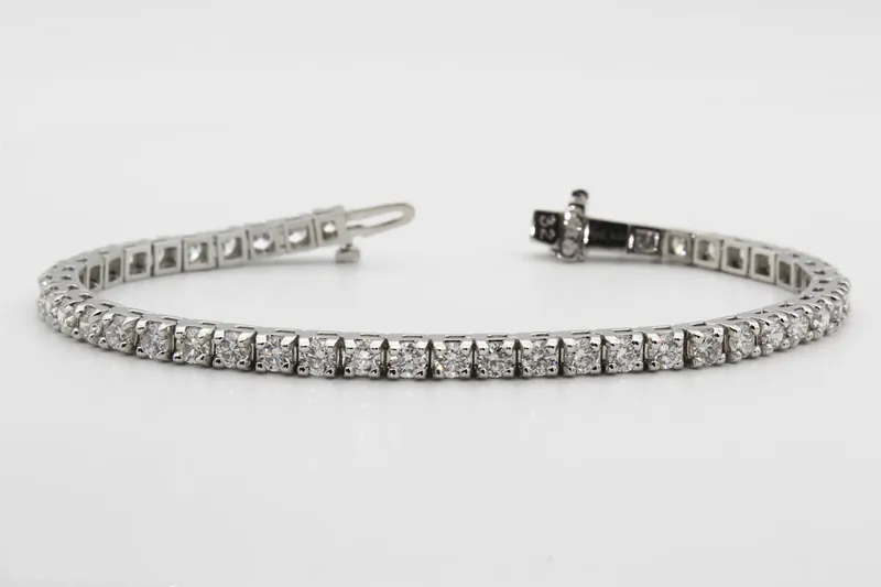 Read article: Tennis Bracelet Cost Guide: Carats, Metals, and Value