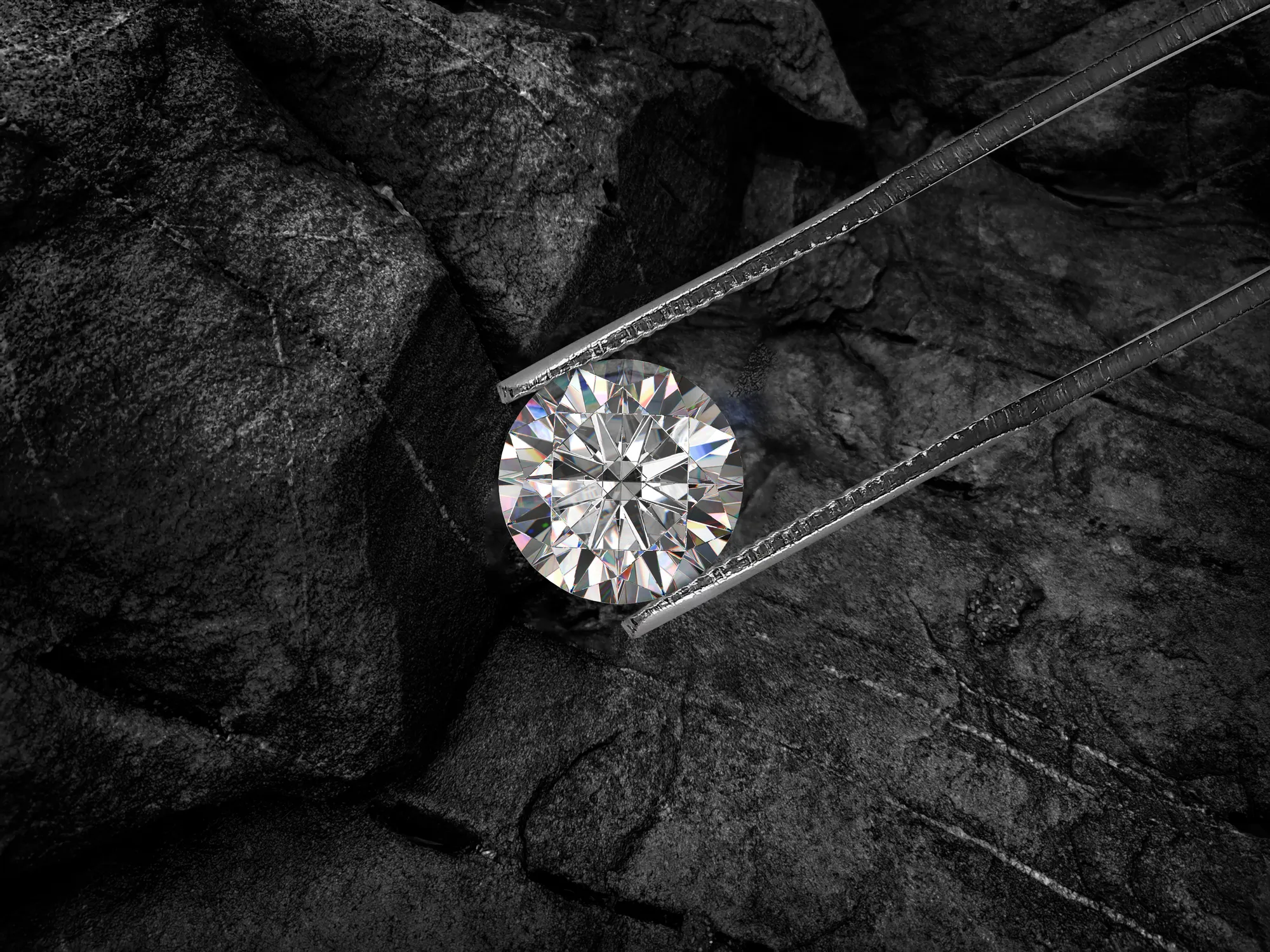A diamond held by tweezers on a dark rocky surface, showcasing its brilliance and natural rarity.