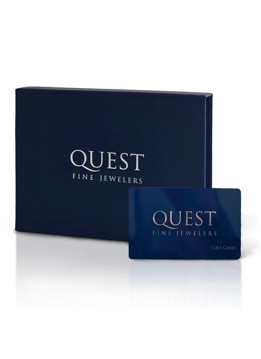 Gift card from Quest Fine Jewelers in a navy box, promoting gift cards now available. Click to explore more!