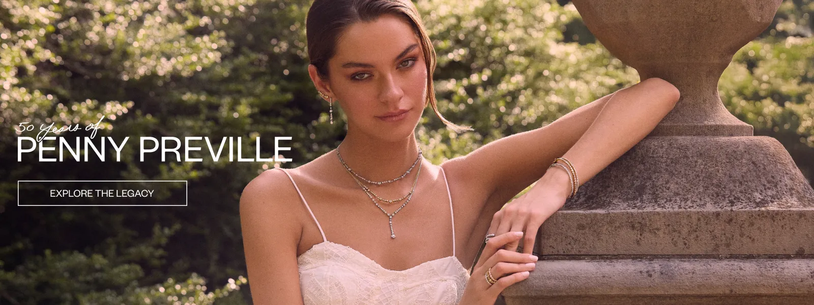 Model wearing Penny Preville jewelry, celebrating 50 years. Click to explore more at Quest Fine Jewelers.