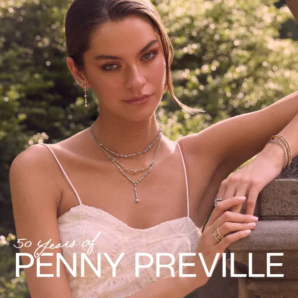 Model wearing Penny Preville jewelry, celebrating 50 years. Click to explore more at Quest Fine Jewelers.