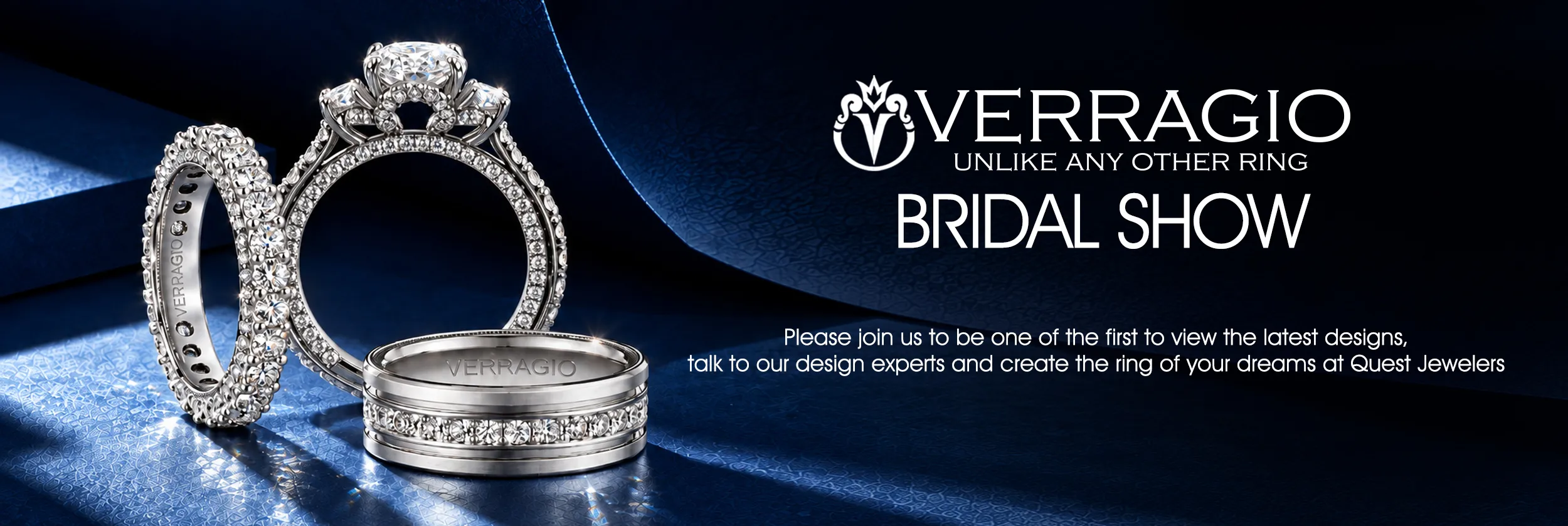 Elegant gold and silver rings with diamonds on a soft fabric background. Click to make an appointment at Quest Fine Jewelers.