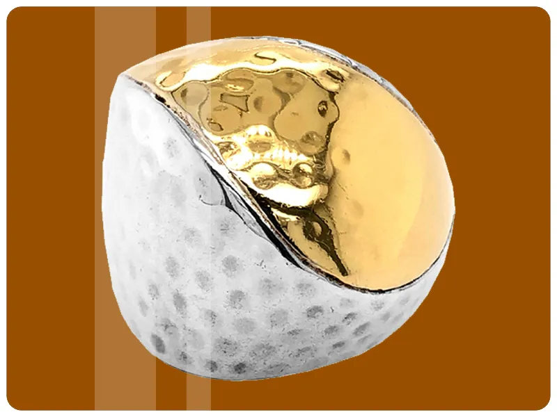 Man wearing gold and black wedding band | Custom Wedding Bands available at Raleigh Diamond Fine Jewelry Raleigh, NC