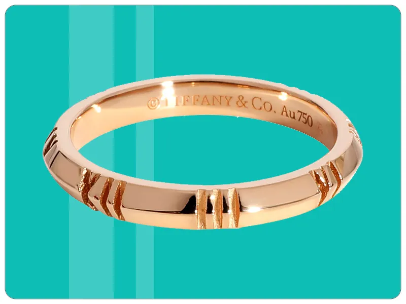 Man wearing gold and black wedding band | Custom Wedding Bands available at Raleigh Diamond Fine Jewelry Raleigh, NC