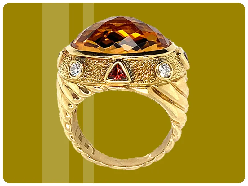 Man wearing gold and black wedding band | Custom Wedding Bands available at Raleigh Diamond Fine Jewelry Raleigh, NC