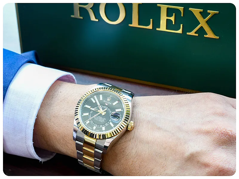 Man wearing gold and black wedding band | Custom Wedding Bands available at Raleigh Diamond Fine Jewelry Raleigh, NC