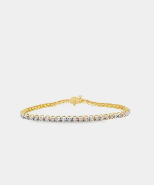 Elegant two-stone engagement ring featuring a pear and round diamond set in white gold. Visit Reiniger Jewelers for details.