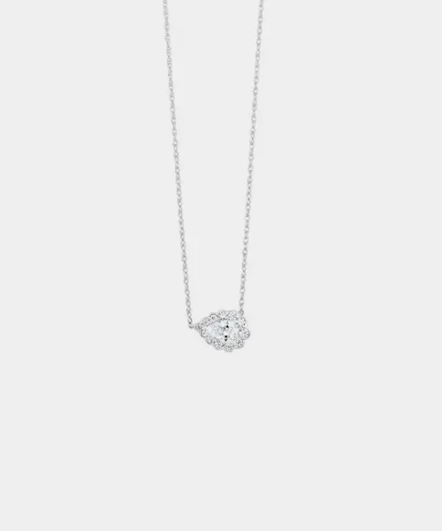 Silver necklace with a sparkling diamond pendant, showcasing elegance and style. Visit Reiniger Jewelers for more.