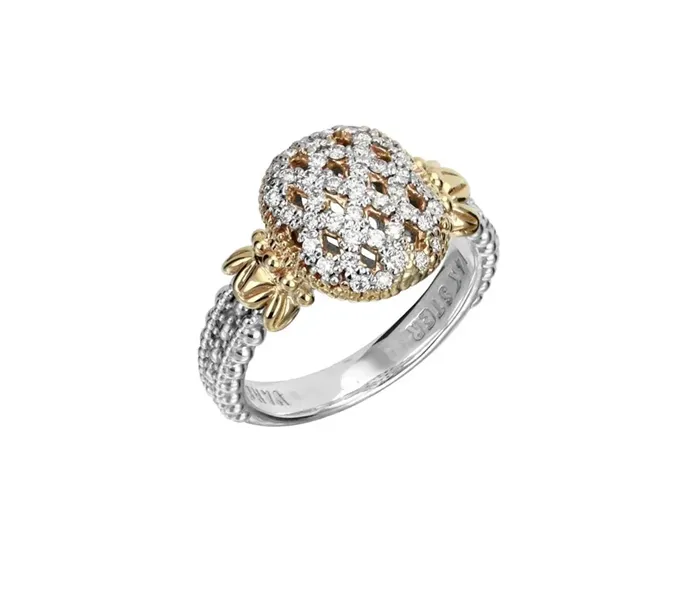Elegant gold and silver ring with diamond accents, featuring a unique pineapple design.