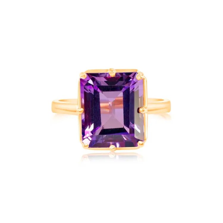 Amethyst ring with a large rectangular stone set in gold.