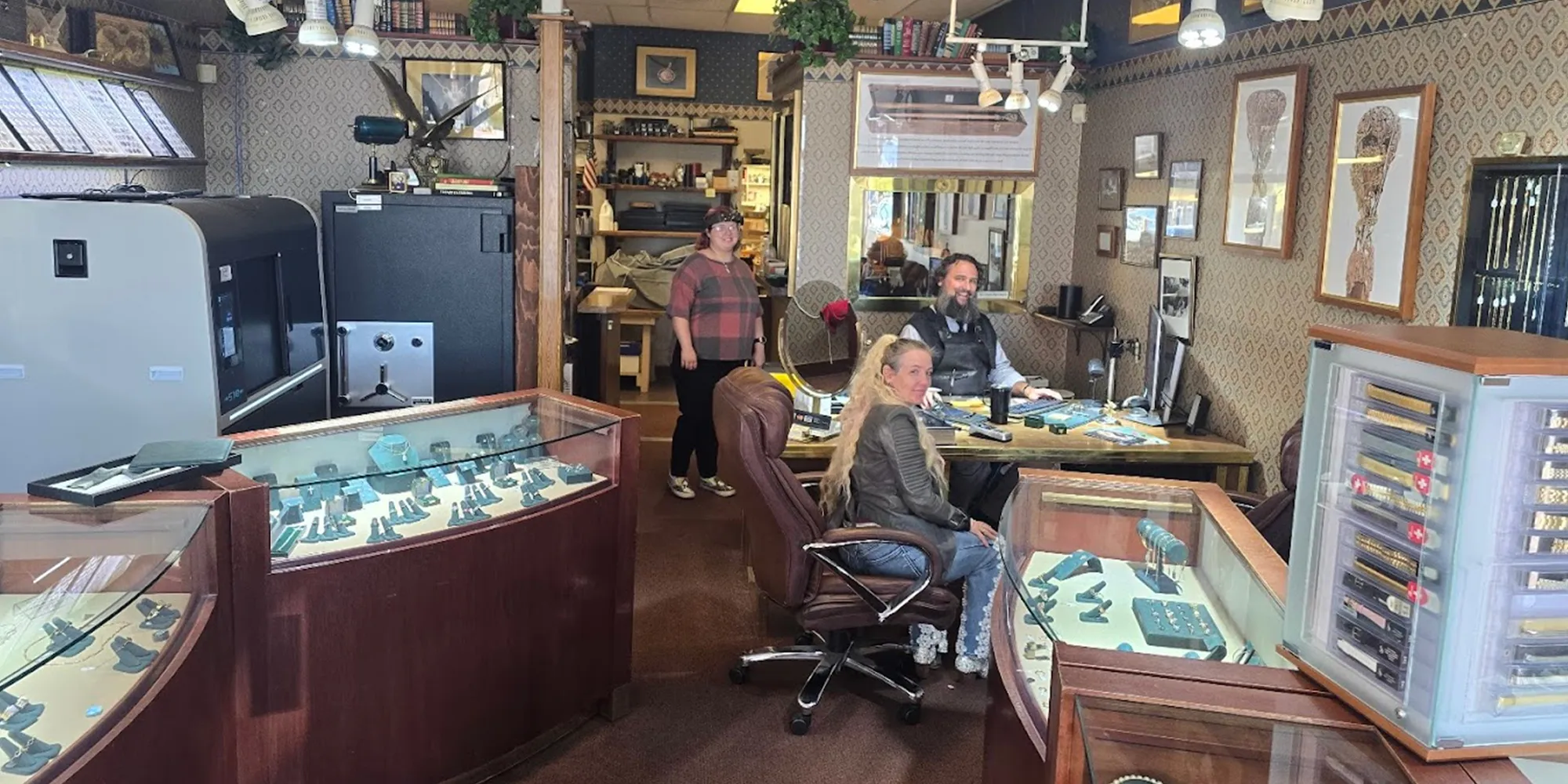 Interior of Rich Custom Jewelry store in Las Vegas, featuring staff and display cases with jewelry.