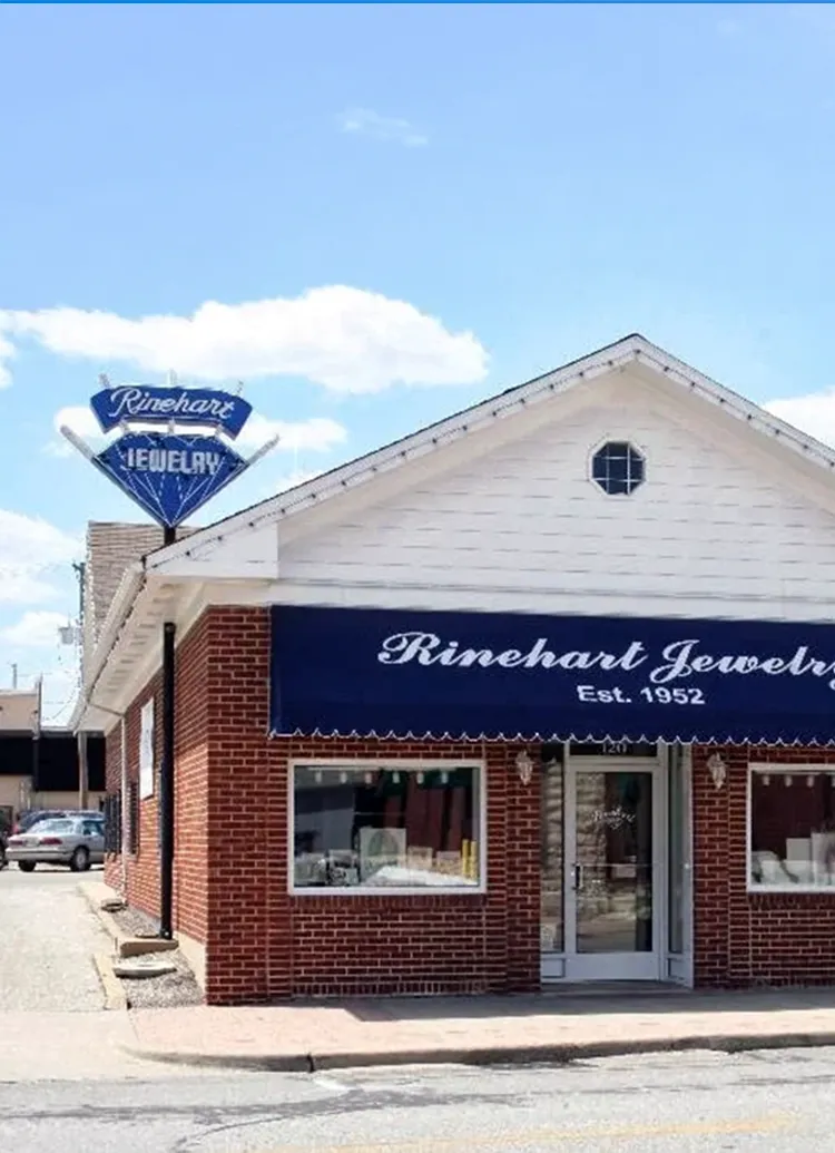 Interior of Rinehart Jewelry Co. in Nevada, showcasing display cases with fine jewelry and engagement rings.