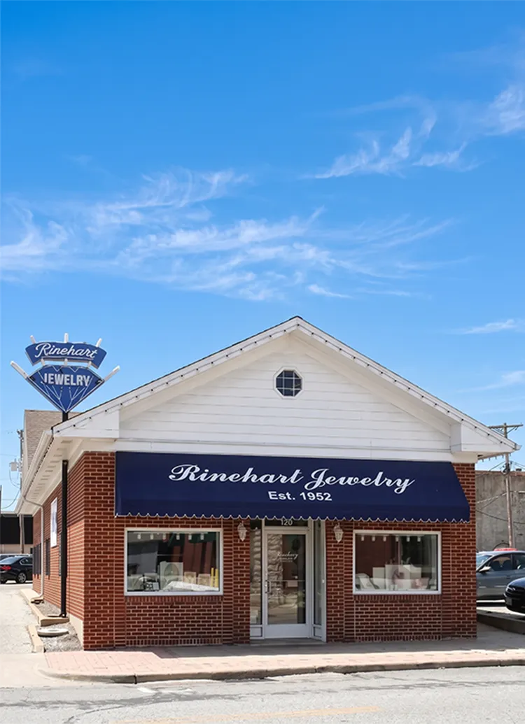 Interior of Rinehart Jewelry Co. in Nevada, showcasing display cases with fine jewelry and engagement rings.