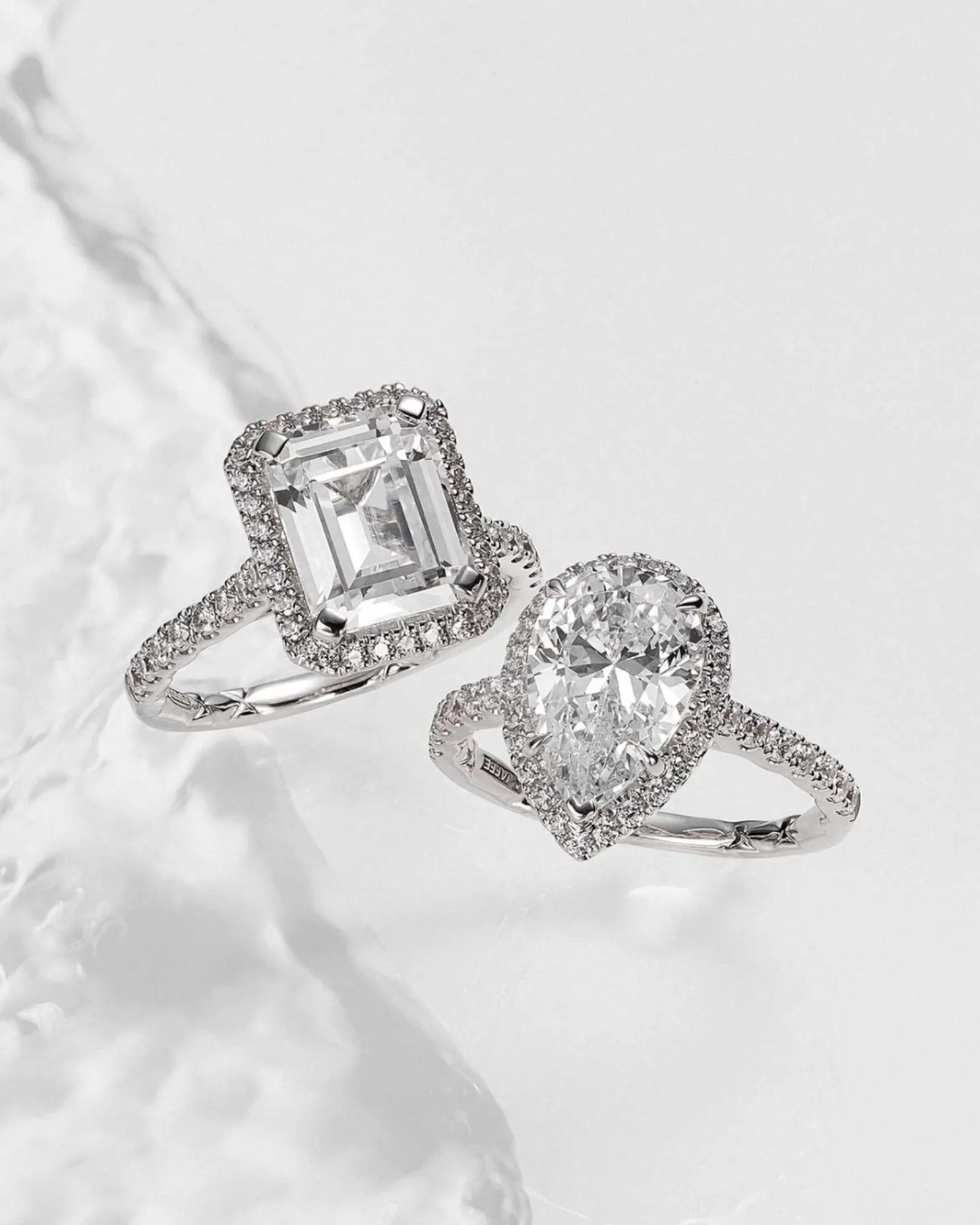 Two elegant diamond engagement rings, one emerald-cut and one pear-shaped. Click to Browse Now.