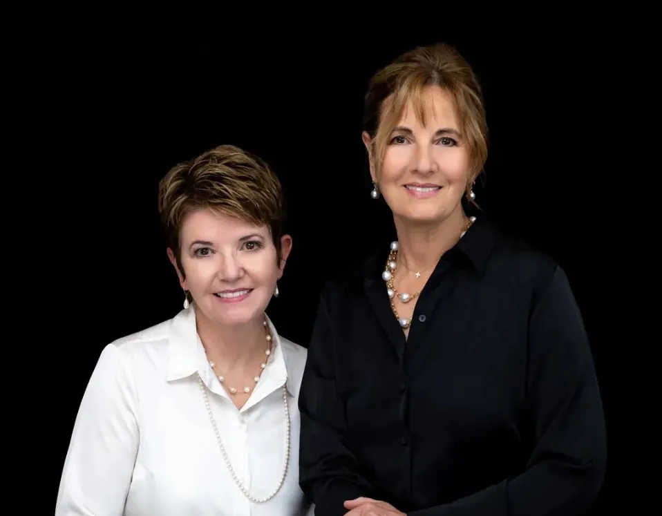 Three elegant green gemstone rings set in gold, showcasing intricate designs and sparkling accents.