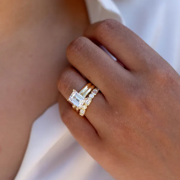 Elegant diamond engagement and wedding rings set, featuring intricate designs and sparkling details. Visit Sather's Leading Jewe