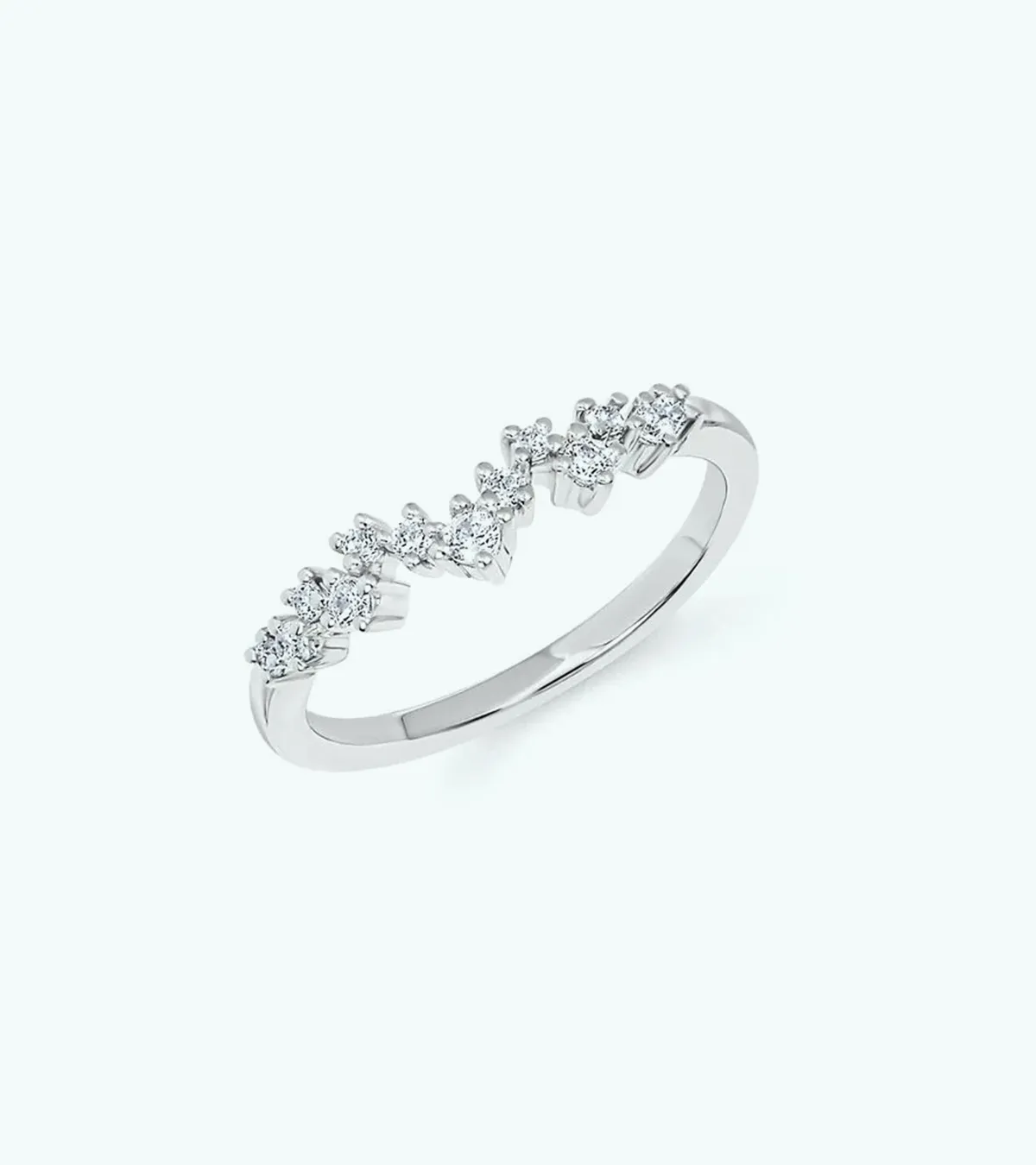 Elegant silver ring with a zigzag pattern of small diamonds.