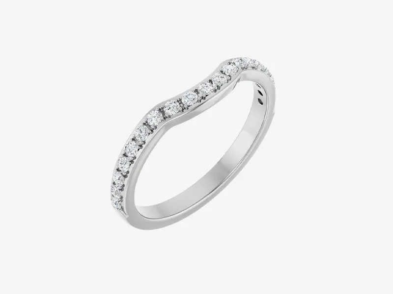 Elegant white gold ring with small diamonds in a curved design.