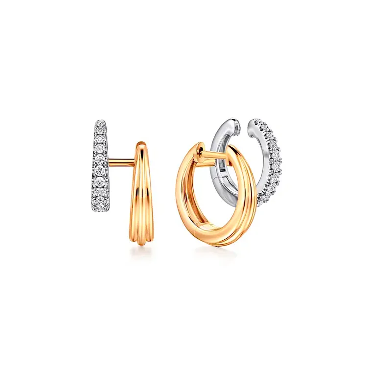 Gold and silver hoop earrings with diamond accents, perfect for any occasion.