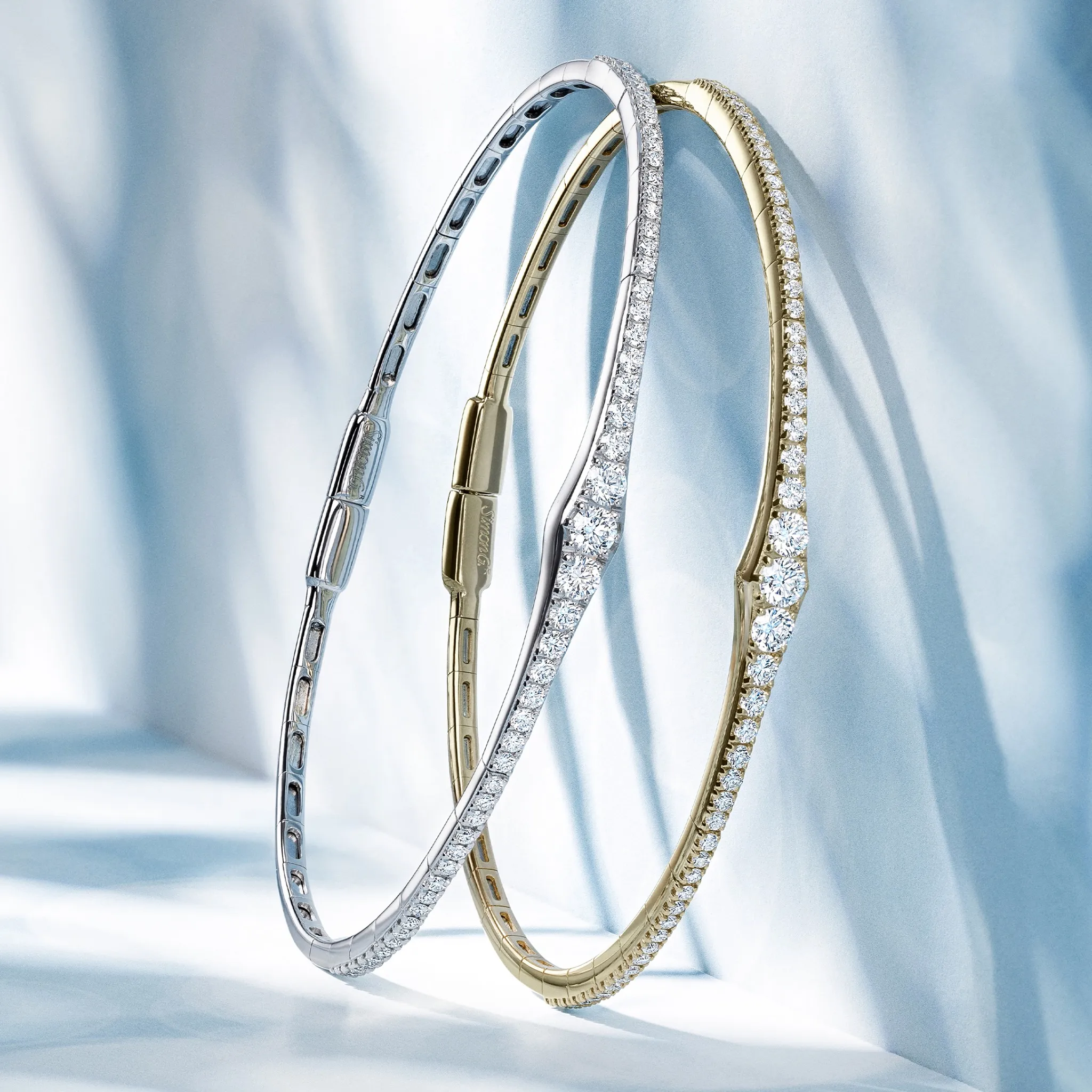 Rose gold ring with sparkling diamonds, displayed in a jewelry box.