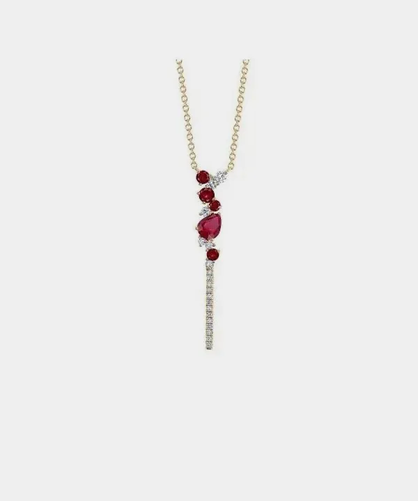 Elegant red gemstone pendant necklace with diamonds on a delicate chain.